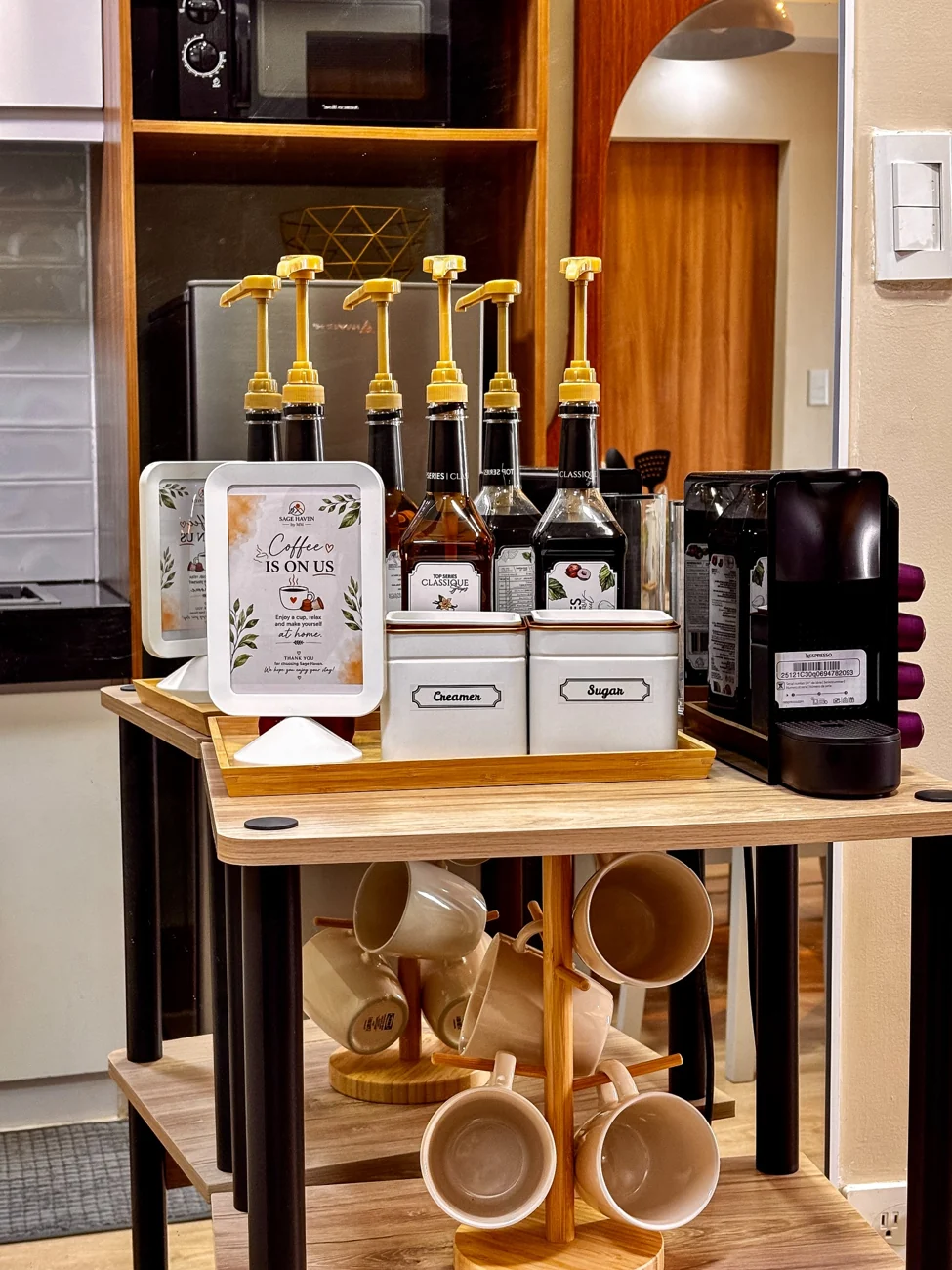 Sage Haven's coffee cart with mugs and a Nespresso machine